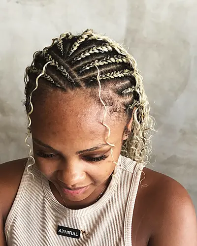 Boho braids with curls worn by a client