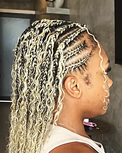 Colour braids worn by a client