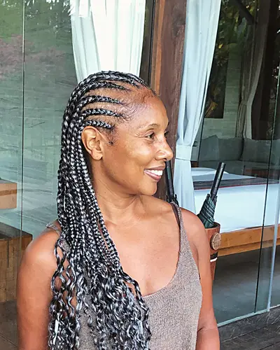 Feed in cornrows worn by a client